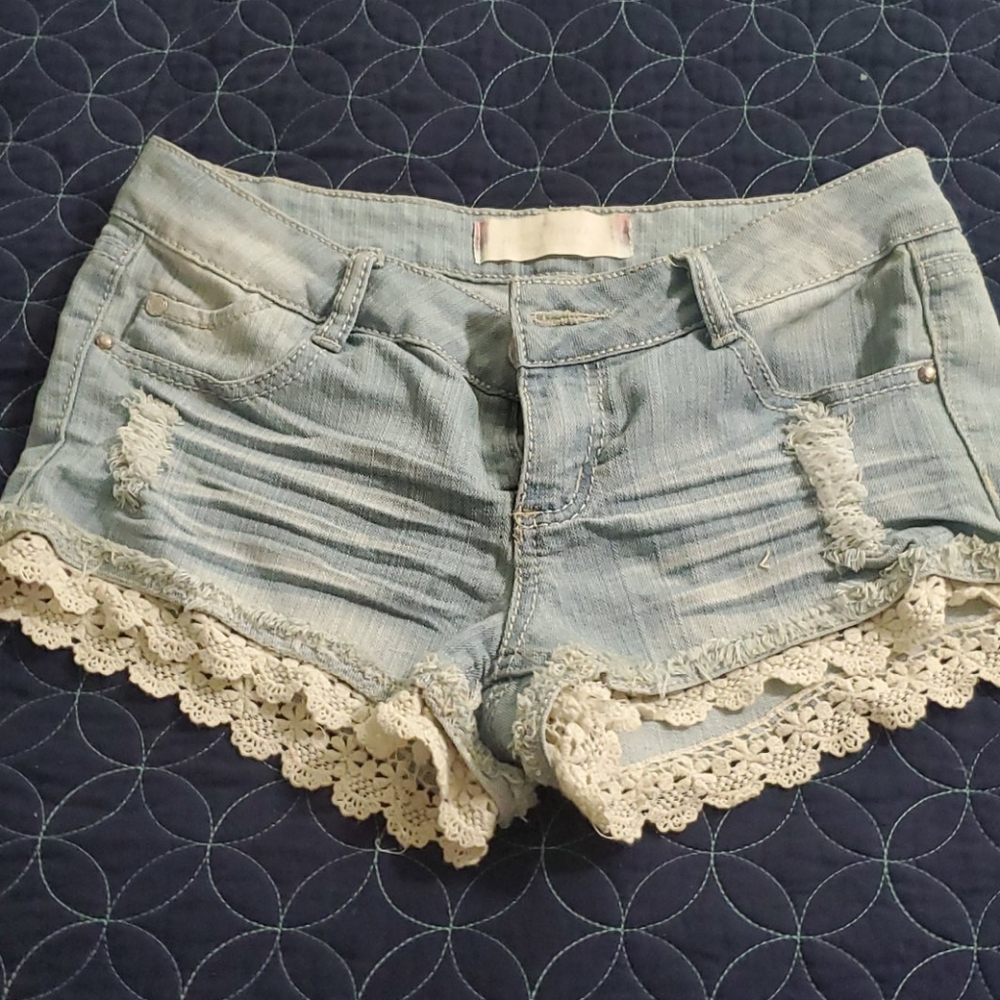 Cute blue jean shorts with laced bottom